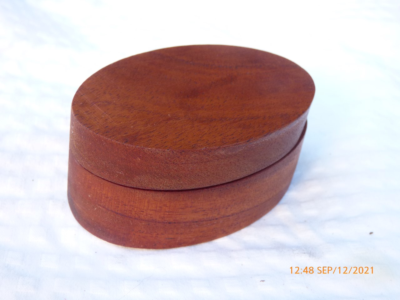 Mahogany oval box carved